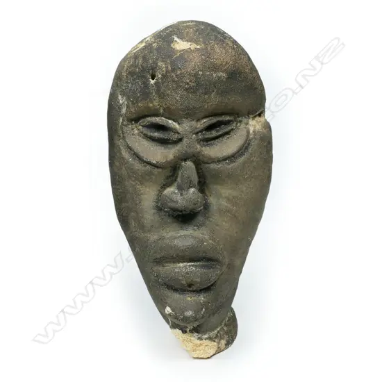 A Solomon Islands carved coral head,